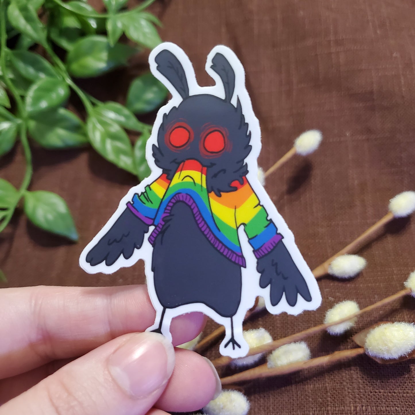 Mothman Eating His Own Sweater Sticker (Rainbow)