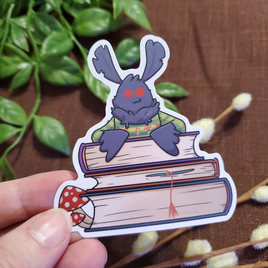 Mothman With Pile of Books