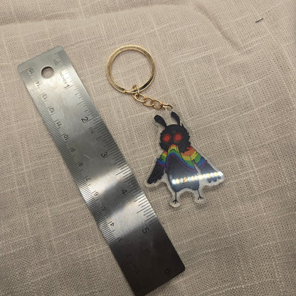 Mothman Eating His Own Rainbow Sweater Keychain Charm