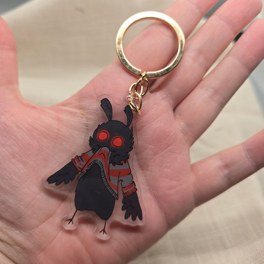 Mothman Eating His Own Sweater Keychain Charm