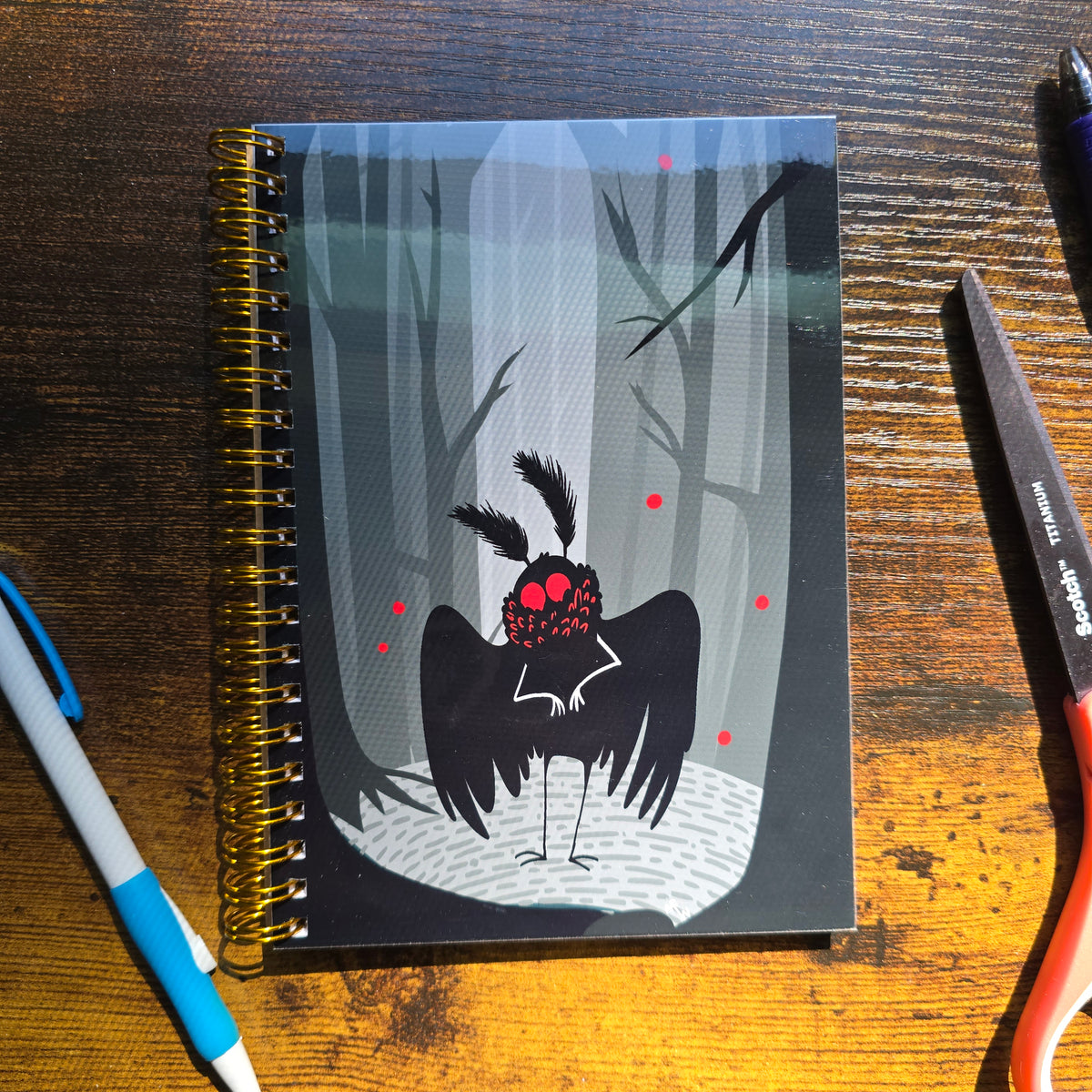 Cute Spooky Mothman in Woods Notebook